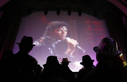 Michael Jackson onscreen in French theatre as fans await the move, "This Is It."