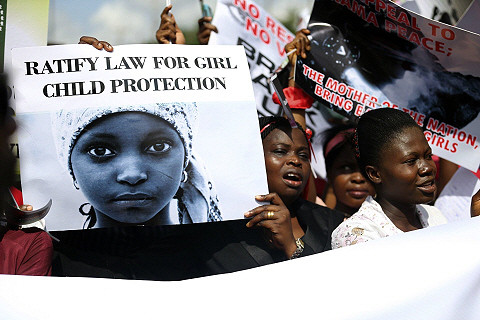 Nigerians call for justice on behalf of girls kidnapped by Boko Haram. (photo by Reuters)